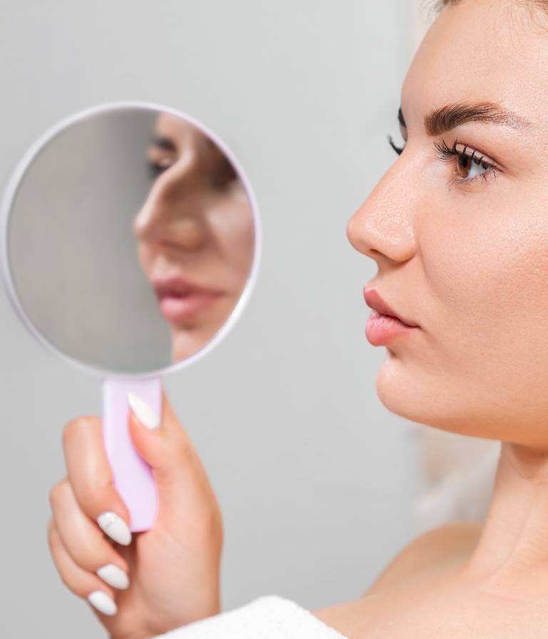 woman before and after non-surgical rhinoplasty