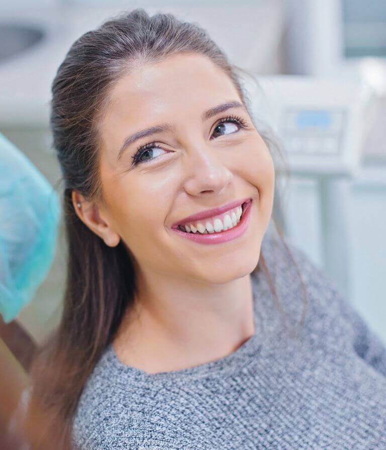 woman smiling after rosacea treatment in Liverpool
